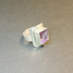 Sterling silver, .925, purple stone, size 10 ring